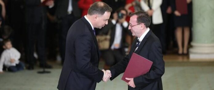 Mariusz Kamiński z prezydentem Dudą fot. gov. pl